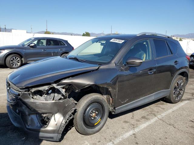 MAZDA CX-5 2016 with VIN JM3KE4DY5G0839242 - Photo from auction
