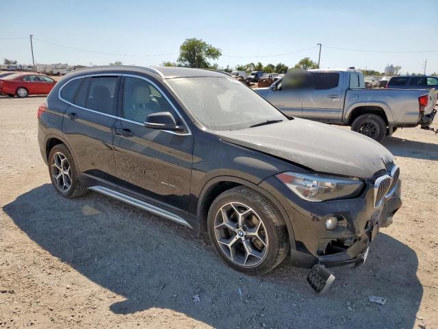 Photo 4 from auction – 2018 BMW X1 XDRIVE2 with VIN WBXHT3C32J5K20880