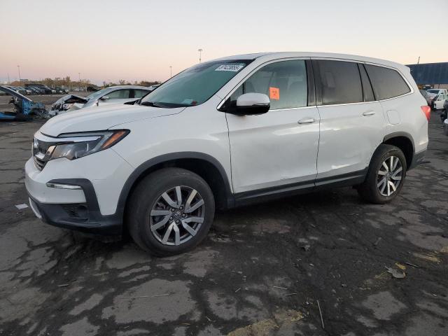 HONDA PILOT EXL 2021 with VIN 5FNYF6H53MB052797 - Photo from auction