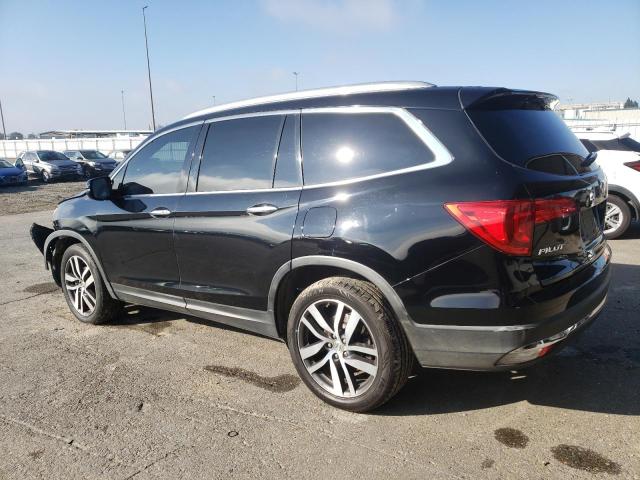 Photo 2 from auction – 2016 HONDA PILOT TOURING with VIN 5FNYF6H92GB110843