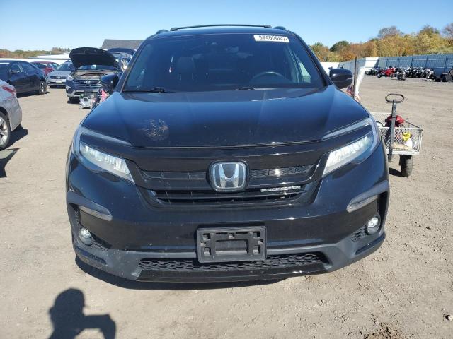 Photo 5 from auction – 2021 HONDA PILOT BLAC with VIN 5FNYF6H77MB005404