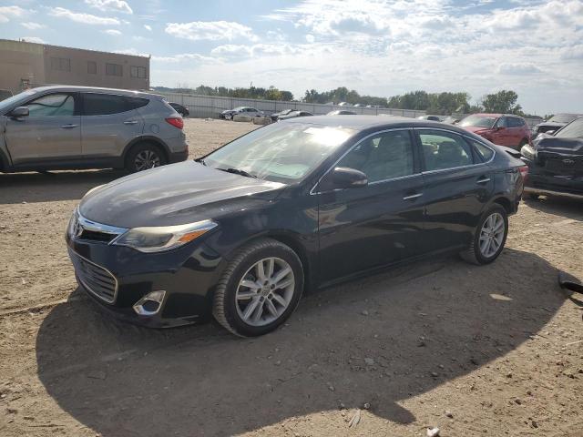 TOYOTA AVALON 2014 with VIN 4T1BK1EB6EU093945 - Photo from auction