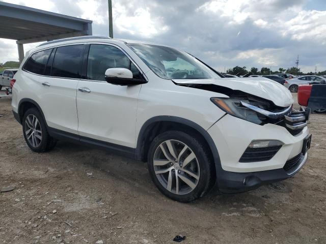 Photo 4 from auction – 2017 HONDA PILOT ELIT with VIN 5FNYF6H07HB103244