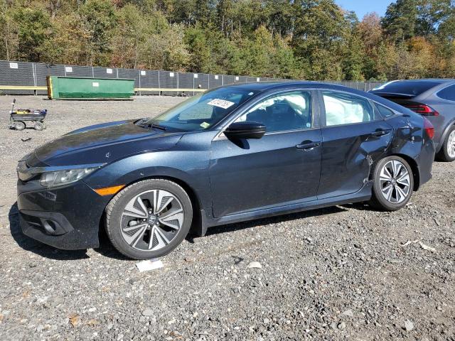 HONDA CIVIC EX 2016 with VIN 19XFC1F36GE038858 - Photo from auction