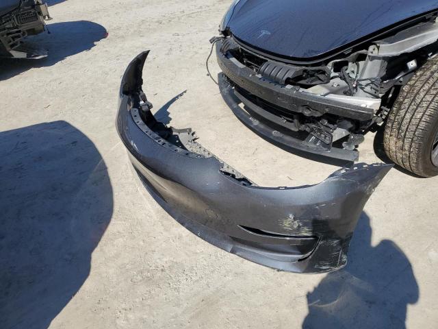 Photo 12 from auction – 2023 TESLA MODEL 3 with VIN 5YJ3E1EA4PF700251