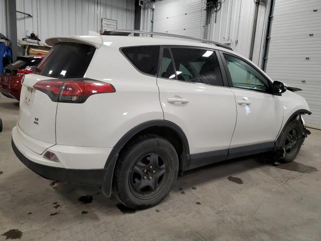Photo 3 from auction – 2017 TOYOTA RAV4 LE with VIN 2T3BFREV2HW664985