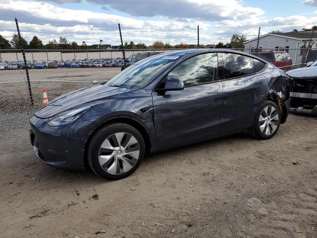 TESLA MODEL Y 2023 with VIN 7SAYGDEE9PA045993 - Photo from auction