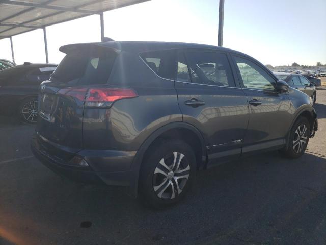 Photo 3 from auction – 2018 TOYOTA RAV4 LE with VIN JTMZFREV0JJ747902