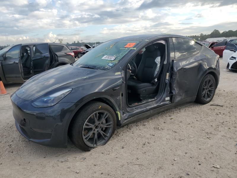 TESLA MODEL Y 2024 with VIN 7SAYGDED8RF100057 - Photo from auction