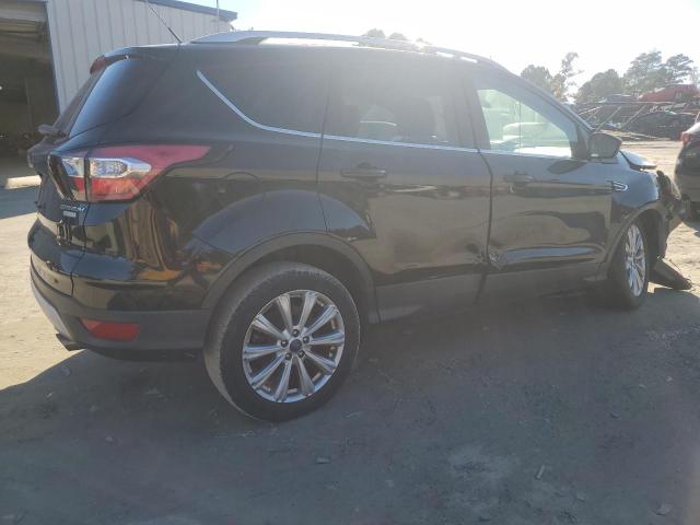 Photo 3 from auction – 2017 FORD ESCAPE TIT with VIN 1FMCU0JDXHUC60909