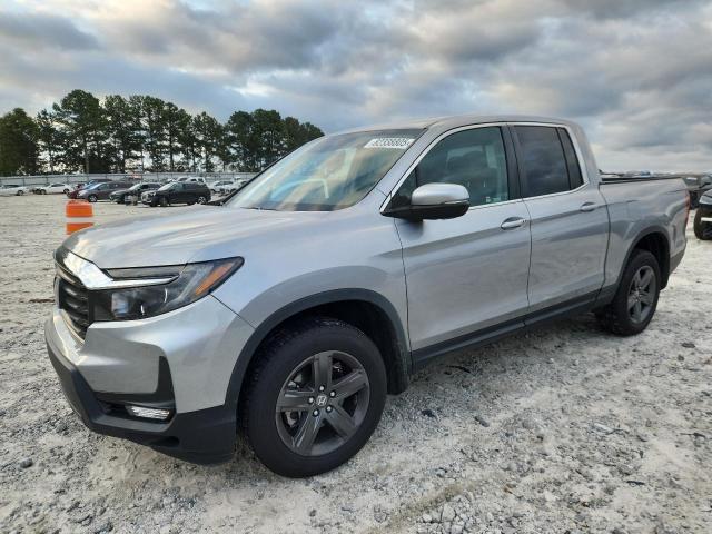 HONDA RIDGELINE 2023 with VIN 5FPYK3F59PB002320 - Photo from auction