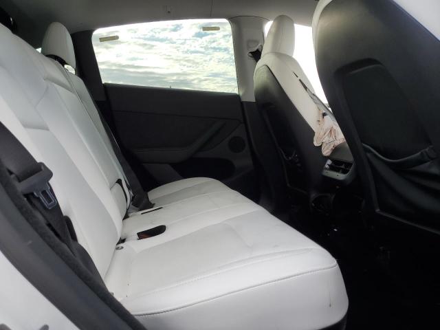 Photo 11 from auction – 2023 TESLA MODEL Y with VIN 7SAYGDEE9PA098533