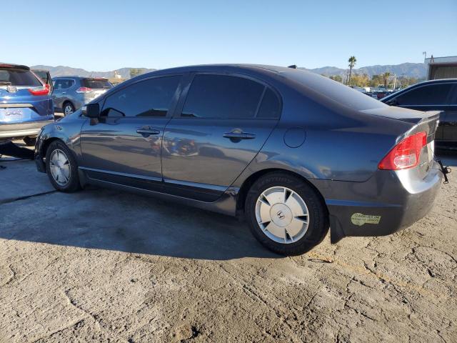 Photo 2 from auction – 2006 HONDA CIVIC HYBR with VIN JHMFA36226S014902