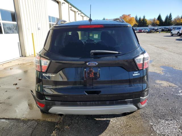 Photo 6 from auction – 2018 FORD ESCAPE SE with VIN 1FMCU9GD5JUC37118