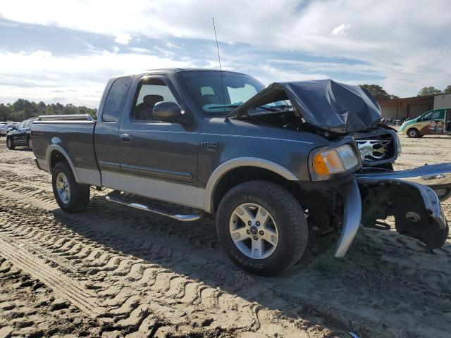 Photo 4 from auction – 2002 FORD F150 with VIN 1FTRX18L52NA74799