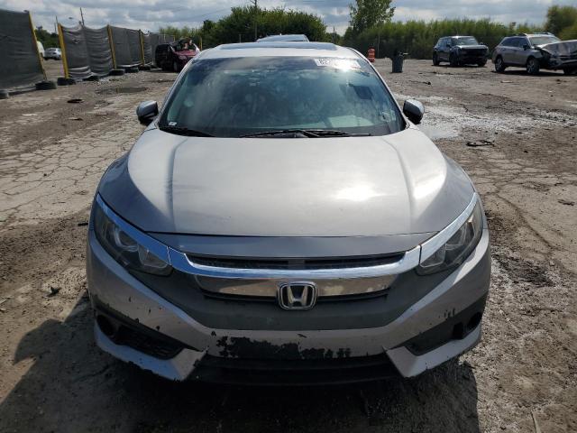 Photo 5 from auction – 2018 HONDA CIVIC EX with VIN 19XFC2F85JE004788