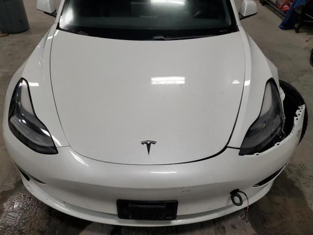 Photo 11 from auction – 2021 TESLA MODEL 3 with VIN 5YJ3E1EA7MF031551