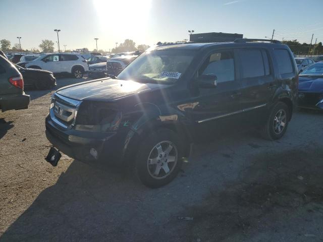 HONDA PILOT TOUR 2010 with VIN 5FNYF4H94AB013770 - Photo from auction