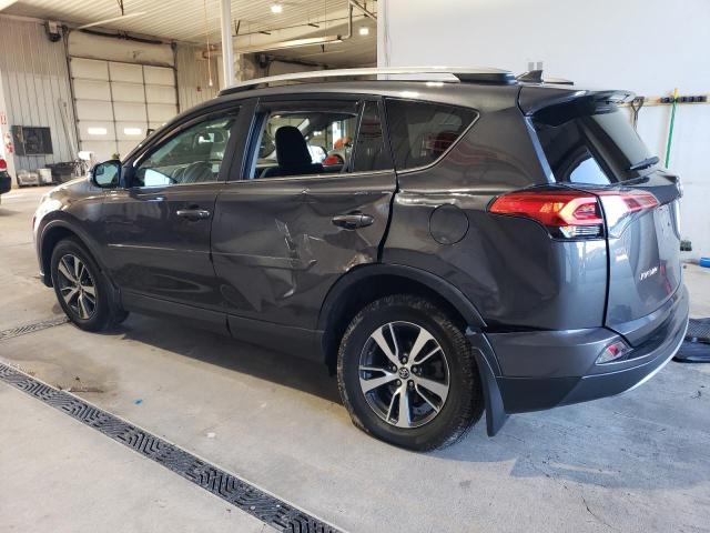 Photo 2 from auction – 2017 TOYOTA RAV4 XLE with VIN 2T3RFREV7HW652569