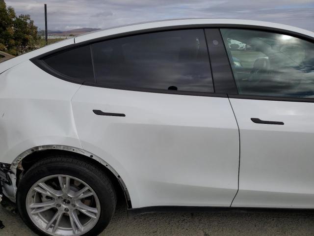 Photo 10 from auction – 2023 TESLA MODEL Y with VIN 7SAYGDEE0PF582951