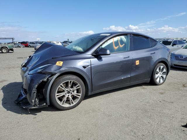 TESLA MODEL Y 2022 with VIN 7SAYGAEE2NF345566 - Photo from auction