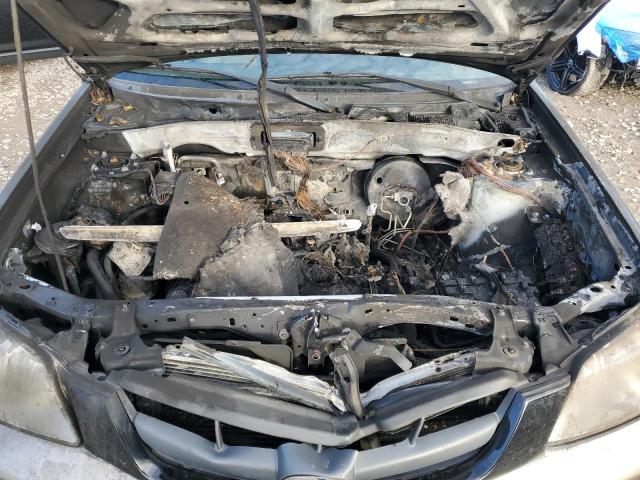 Photo 11 from auction – 2003 MAZDA TRIBUTE ES with VIN 4F2CZ96113KM52829