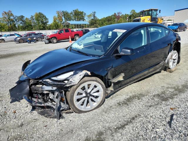 TESLA MODEL 3 2023 with VIN 5YJ3E1EB7PF699072 - Photo from auction