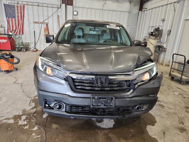 Photo 5 from auction – 2017 HONDA RIDGELINE with VIN 5FPYK3F64HB024056