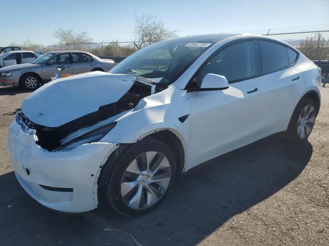 TESLA MODEL Y 2022 with VIN 7SAYGDEE2NF411115 - Photo from auction