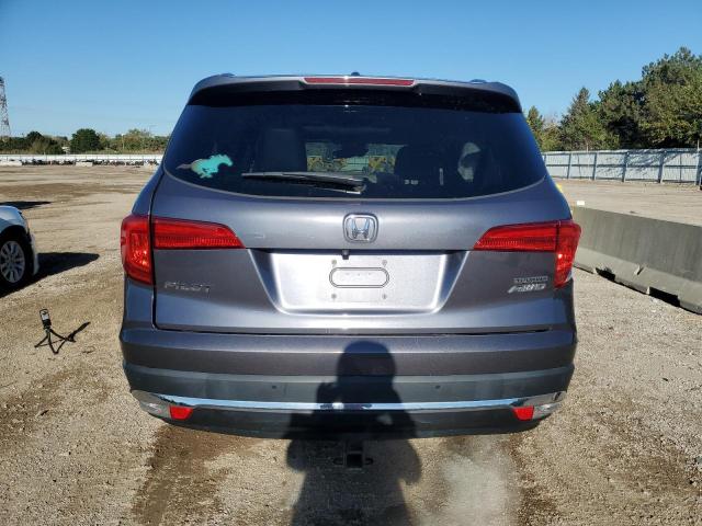 Photo 6 from auction – 2018 HONDA PILOT TOUR with VIN 5FNYF6H91JB005668