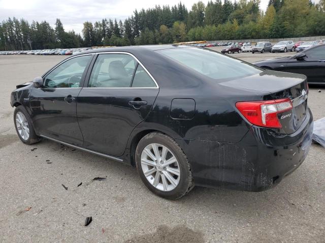 Photo 2 from auction – 2012 TOYOTA CAMRY HYBR with VIN 4T1BD1FK7CU037678