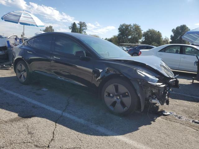 Photo 4 from auction – 2022 TESLA MODEL 3 with VIN 5YJ3E1EA4NF373377