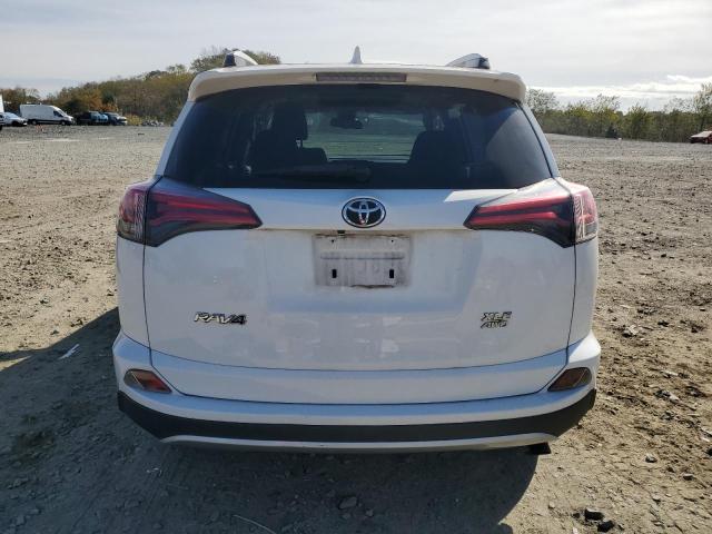 Photo 6 from auction – 2017 TOYOTA RAV4 XLE with VIN JTMRFREV2HD209615