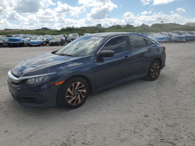 HONDA CIVIC EX 2018 with VIN 19XFC2F72JE035858 - Photo from auction