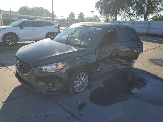 MAZDA CX-5 TOURI 2016 with VIN JM3KE2CY9G0880916 - Photo from auction