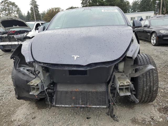 Photo 5 from auction – 2023 TESLA MODEL Y with VIN 7SAYGDEEXPF855197