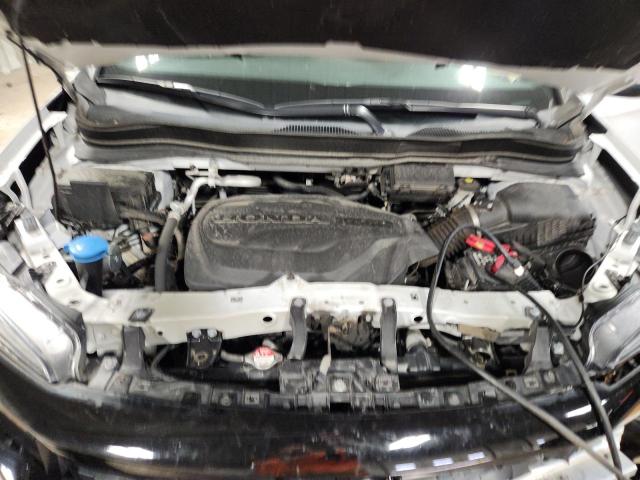 Photo 12 from auction – 2021 HONDA PASSPORT E with VIN 5FNYF8H52MB003912