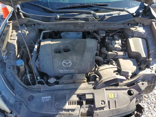 Photo 12 from auction – 2015 MAZDA CX-5 TOURI with VIN JM3KE2CY8F0440037
