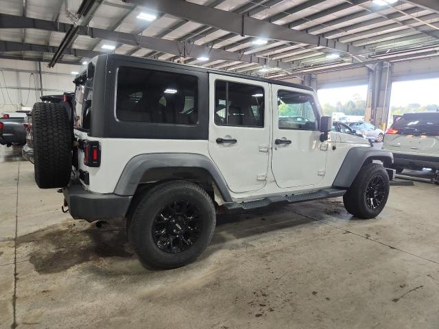 Photo 3 from auction – 2014 JEEP WRANGLER U with VIN 1C4BJWDG5EL113142