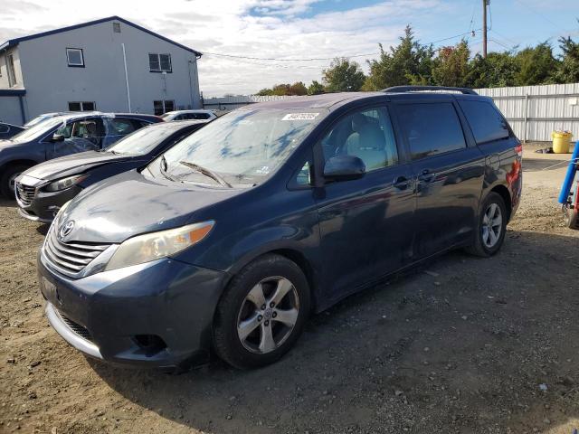 TOYOTA SIENNA LE 2011 with VIN 5TDKK3DC4BS142117 - Photo from auction