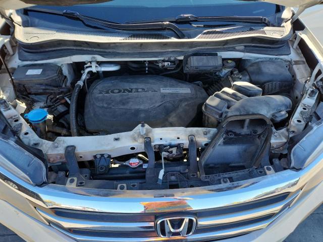 Photo 12 from auction – 2016 HONDA PILOT EXL with VIN 5FNYF6H85GB077280