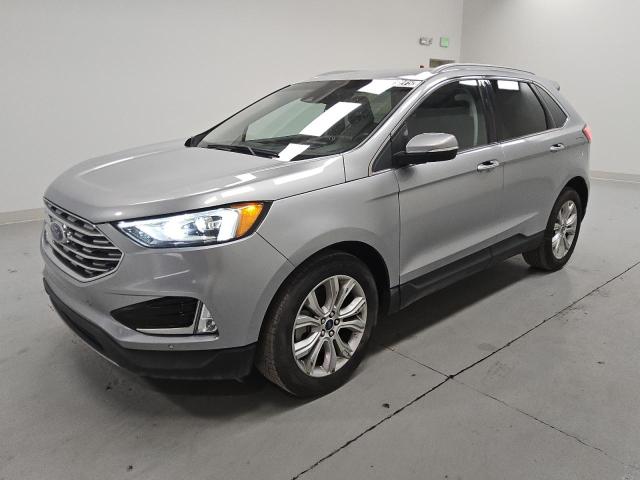 FORD EDGE TITANIUM 2022 with VIN 2FMPK4K97NBA00669 - Photo from auction