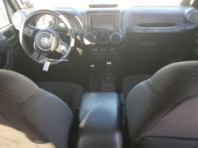 Photo 8 from auction – 2014 JEEP WRANGLER U with VIN 1C4BJWDG3EL120641