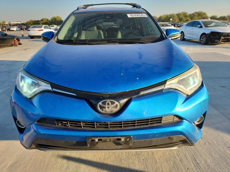 Photo 5 from auction – 2017 TOYOTA RAV4 XLE with VIN JTMWFREV9HJ710442