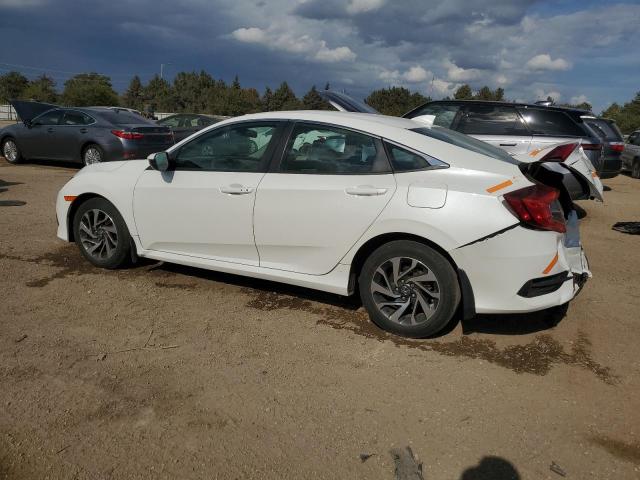 Photo 2 from auction – 2018 HONDA CIVIC EX with VIN 19XFC2F70JE017052