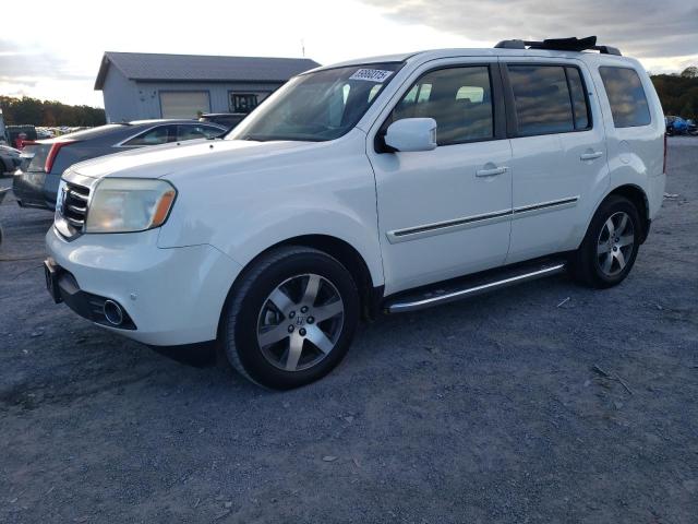 HONDA PILOT TOUR 2013 with VIN 5FNYF4H92DB080128 - Photo from auction