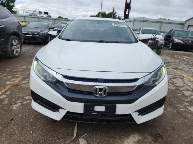 Photo 5 from auction – 2018 HONDA CIVIC LX with VIN 2HGFC2F55JH568520