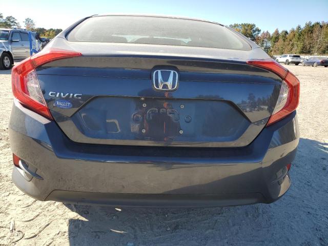Photo 6 from auction – 2017 HONDA CIVIC LX with VIN 19XFC2F51HE051476