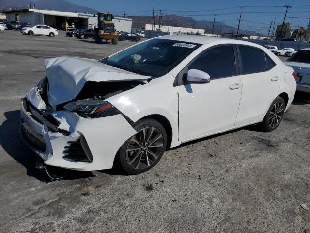 TOYOTA COROLLA L 2019 with VIN 2T1BURHE9KC148884 - Photo from auction