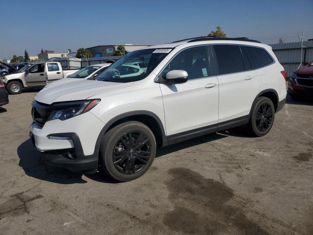 HONDA PILOT SE 2022 with VIN 5FNYF6H21NB093369 - Photo from auction